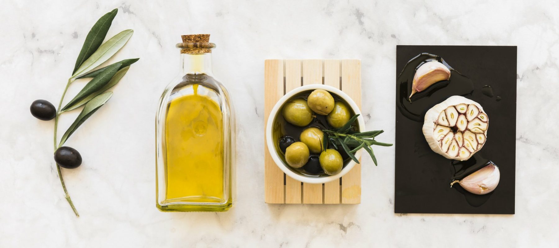 olives-with-bottle-garlic-bulb-cloves-min